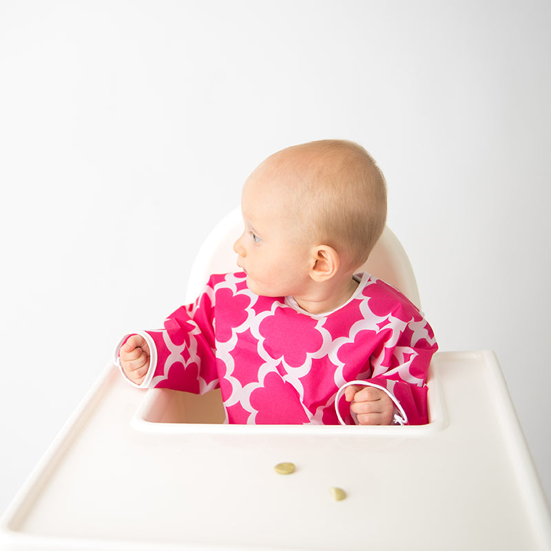 Baby in Cleanbib With Sleeves | Fuchsia Modern Flowers